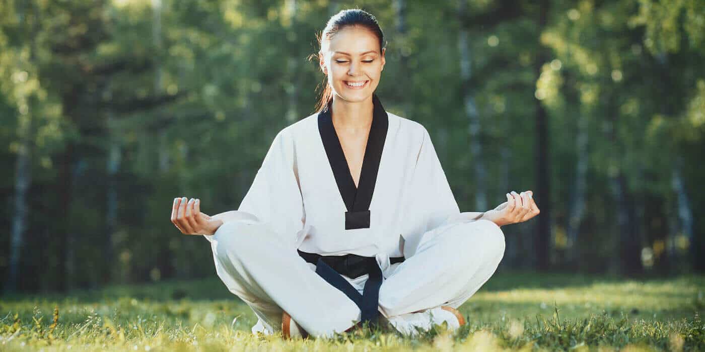 Martial Arts Lessons for Adults in Woodbridge VA - Happy Woman Meditated Sitting Background